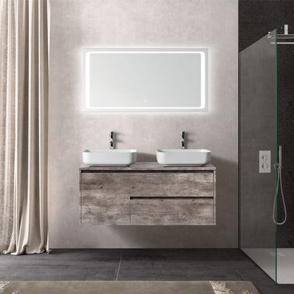 Moderne badkamer met wastafelmeubel, verlichte rechthoekige spiegel en grijze wandtegels.